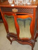 A glazed Edwardian music cabinet. COLLECT ONLY.