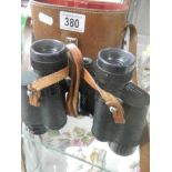 A cased pair of French Denhill 8 x 30 binoculars, J A Dave & son, London.