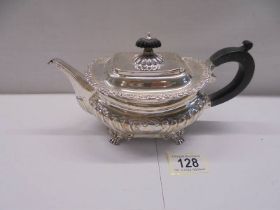 A hall marked silver teapot, total weight 18 ounces.