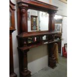 A good quality mahogany fire surround with over-mantle mirror. COLLECT ONLY.