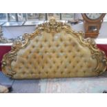 A mid 20th century gilded and deep buttoned head board, COLLECT ONLY.