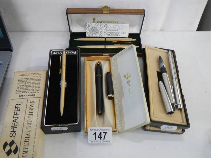 A collection of pens including Papermate, Shaeffer etc., some with gold nibs.