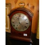 A Victorian mahogany cased bracket clock with silvered dial, in working order, COLLECT ONLY.