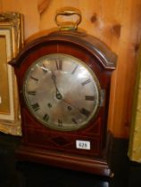A Victorian mahogany cased bracket clock with silvered dial, in working order, COLLECT ONLY.