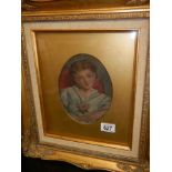 A gilt framed and glazed portrait of a young lady, COLLECT ONLY.