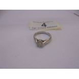 An 18ct white and yellow gold ring set single stone diamond, size I, 2.7 grams.