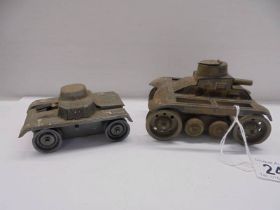 Two tin plate tanks, one marked Germany.