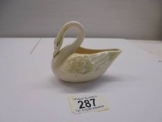 A vintage Belleek swan creamer - 6th mark, 1965 - 1980.