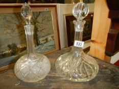 Two early 20th century engraved decanters.