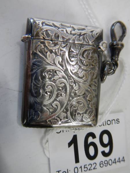A hall marked silver vesta case with gold (375) mounts, in good condition. - Image 6 of 6
