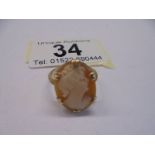 A vintage 9ct gold cameo ring profile of a young woman, size J half, 2.3 grams.