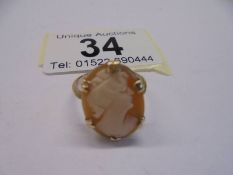 A vintage 9ct gold cameo ring profile of a young woman, size J half, 2.3 grams.