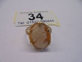 A vintage 9ct gold cameo ring profile of a young woman, size J half, 2.3 grams.