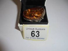A Colonia silver and amber dress ring, size Q.