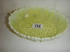 A oval Edwardian uranium glass bowl.