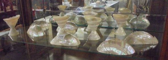 A quantity of mother of pearl items including goblets.