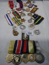 A mixed lot of 20th century medals etc.,