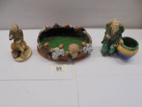 A Japanese hand formed clay bowl with figures and two other figures (one a/f).