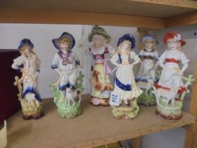 Six 19th century ceramic figures including two pairs.