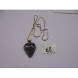 A white metal grey stone pendant on a silver chain, 53 cm long.