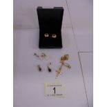 A pair of 18ct (575) gold earrings, a pair of 9ct gold earrings, a 9ct gold cross on chain (2.2 g)