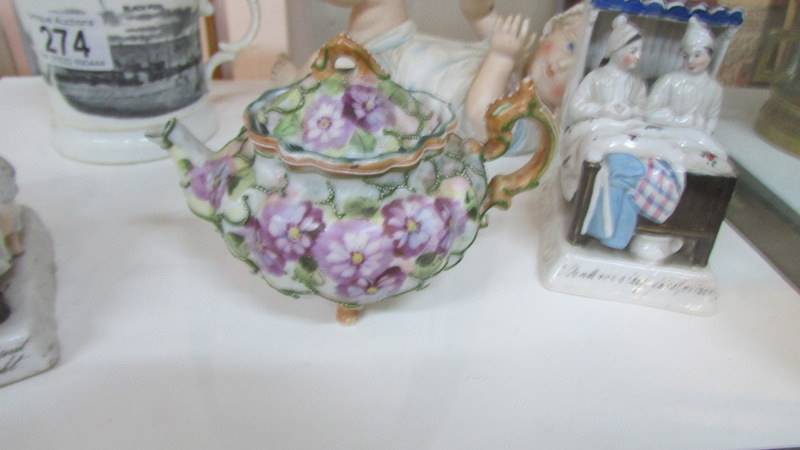 A mixed lot including piano baby, 2 Victorian fairings, small teapot and a Blackpool mug. - Image 2 of 4