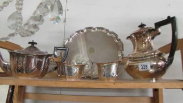 A four piece silver plate teaset with tray.