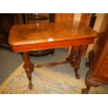A mid Victorian mahogany fold over games table, COLLECT ONLY.