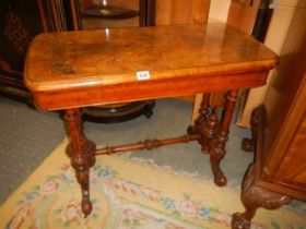 A mid Victorian mahogany fold over games table, COLLECT ONLY.