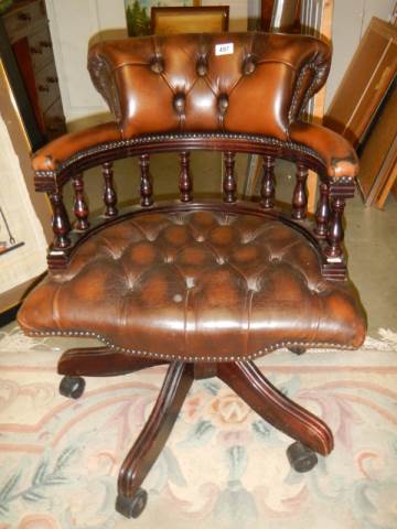 A deep buttoned executive chair,. COLLECT ONLY.