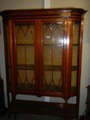 A Victorian bow front display cabinet, COLLECT ONLY.