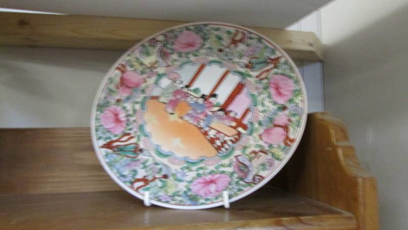 A 19th century Chinese dish and two Chinese plates. - Image 2 of 6