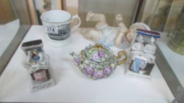 A mixed lot including piano baby, 2 Victorian fairings, small teapot and a Blackpool mug.