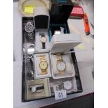 Seven gent's and two ladies wrist watches.