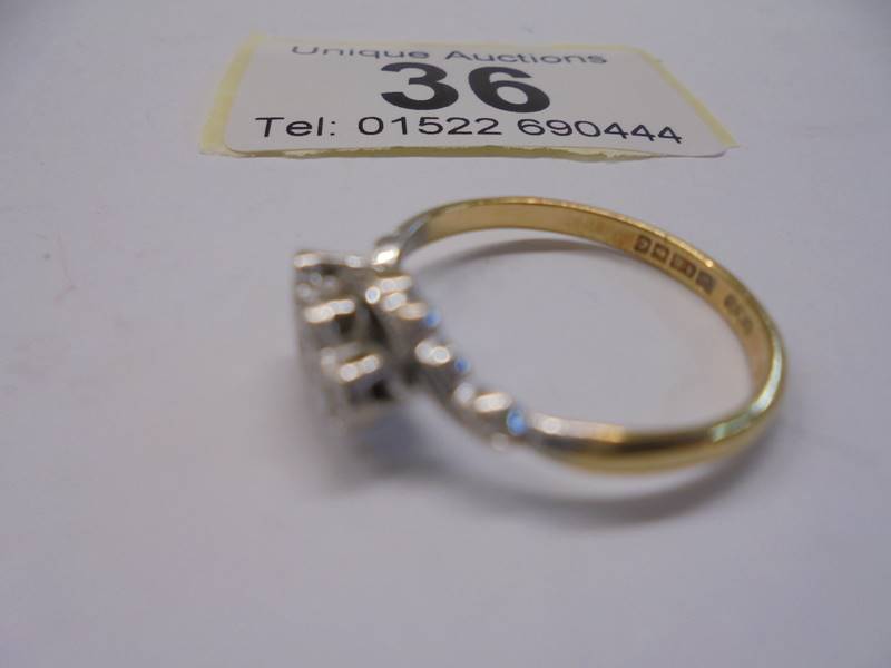 A vintage diamond three stone ring hallmarked for Birmingham in an 18ct gold twist design shank, - Image 2 of 2