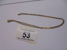 A 9ct gold curb link chain on a bolt ring clasp, 5 grams.
