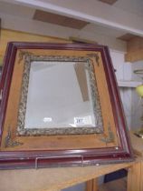 A Bevel edged mirror in a wood and metal frame. COLLECT ONLY.