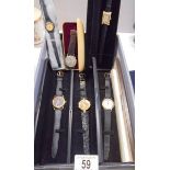 Six wrist watches including vintage.