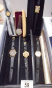 Six wrist watches including vintage.