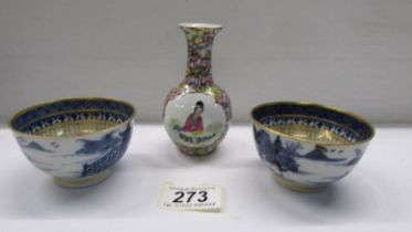 A pair of 19th century Chinese tea bowls (one with early stapled repair) & a miniature Chinese vase.