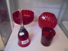 A ruby art glass vase, dish, mug and bell.