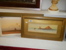 A framed and glazed Egyptian scene in water-colour and an unframed similar scene, COLLECT ONLY.