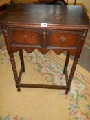 A two drawer Edwardian hall table on bobbin turned supports. COLLECT ONLY.