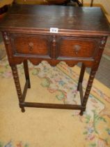 A two drawer Edwardian hall table on bobbin turned supports. COLLECT ONLY.