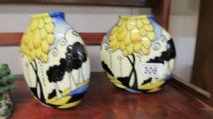 A pair of old Tupton ware vases.