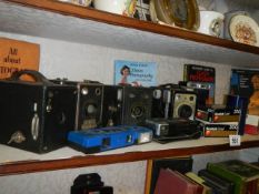 A mixed lot of vintage camera's etc.,