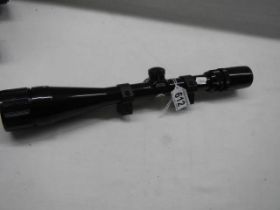 A Bushnell Banner 6 - 18 x 40 rifle scope.