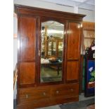 A mahogany inlaid wardrobe with central mirrored door and two drawers, COLLECT ONLY.