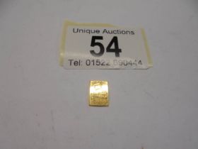 A 1 gram fine gold bar, (24 carat).