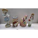 Three ceramic figures and a Toby jug.